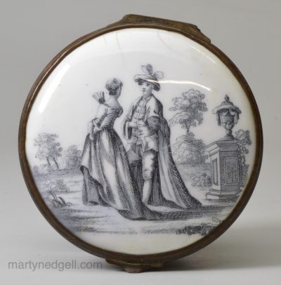 Birmingham enamel snuff box decorated with a print of a couple in a garden, circa 1770