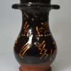 Slipware pottery puzzle jug, circa 1740