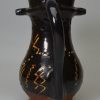 Slipware pottery puzzle jug, circa 1740