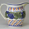 Prattware pottery jug moulded with vine leaves and grapes, circa 1820