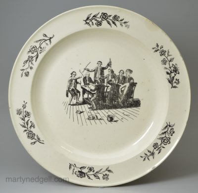 Creamware pottery plate printed with of a drinking party, circa 1790, possibly Liverpool Pottery