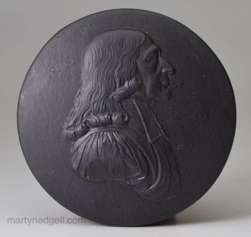 Wedgwood black basalt disk moulded with John Wesley, circa 1800