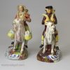 Pair of Staffordshire pearlware figures of the Welsh Tailor and his Wife, circa 1820