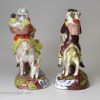 Pair of Staffordshire pearlware figures of the Welsh Tailor and his Wife, circa 1820