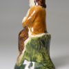 Pearlware pottery figure of a man decorated with colours under the glaze, circa 1800