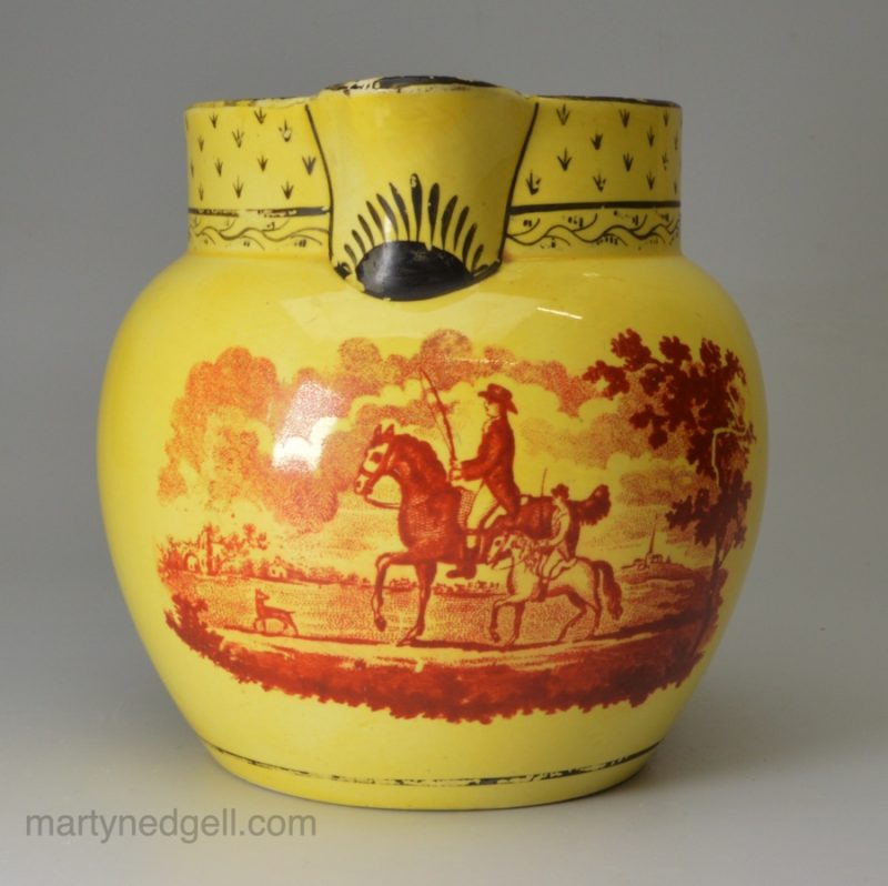 Canary yellow jug decorated with a red print of a man and his son on horseback, circa 1820