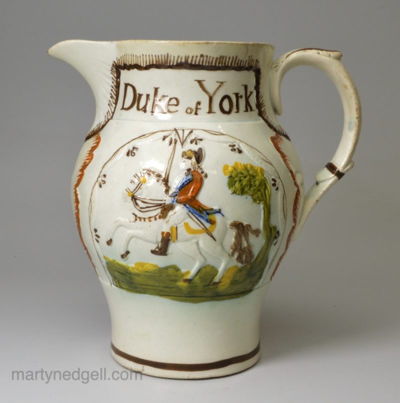 Prattware pottery commemorative jug moulded with the Duke of York and Prince Cobourg, circa 1800