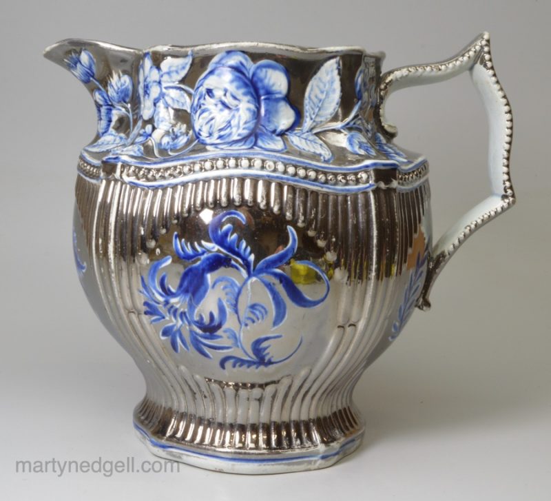 Moulded pearlware and silver resist lustre jug, circa 1820