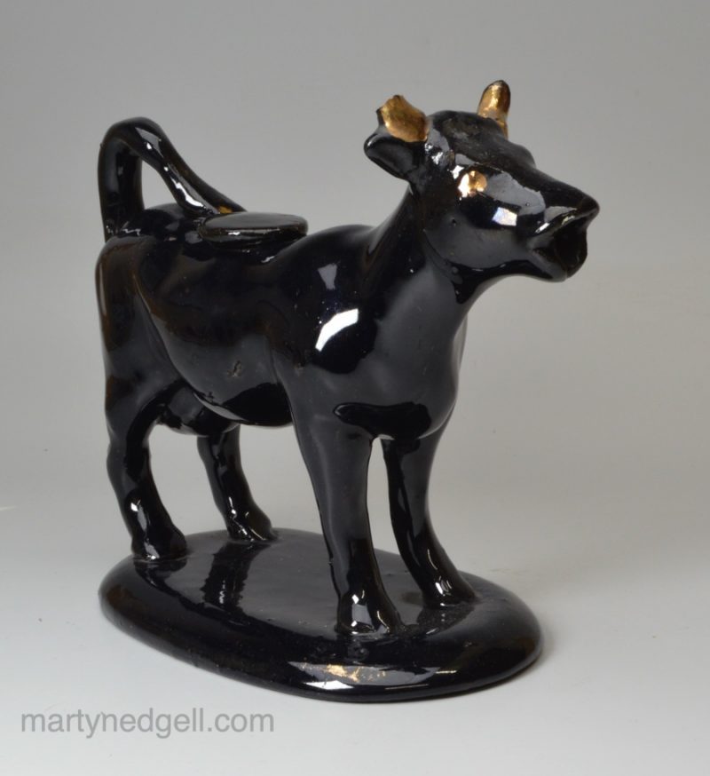 Jackfield black cow creamer, circa 1870