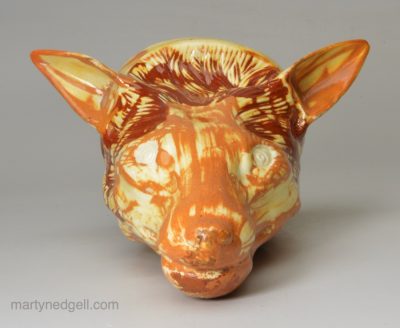 Creamware pottery fox head stirrup cup decorated with brown and tan under the glaze, circa 1800