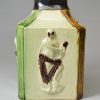 Creamware pottery tea canister moulded with Apollo and decorated with underglaze colours, circa 1770