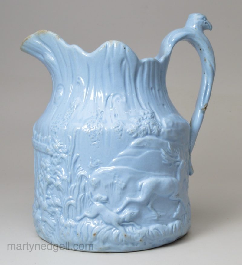 Small relief moulded jug, circa 1850