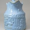 Small relief moulded jug, circa 1850