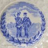 Pearlware pottery child's plate 'BRITISH RIFLE VOLUNTEERS', circa 1859