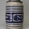 Large Westerwald saltglaze stoneware tankard decorated with panels of horses, circa 1740