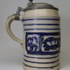 Large Westerwald saltglaze stoneware tankard decorated with panels of horses, circa 1740