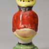 Staffordshire pottery pepper pot modelled as Roger Giles, circa 1820, probably Sherratt pottery