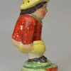 Staffordshire pottery pepper pot modelled as Roger Giles, circa 1820, probably Sherratt pottery