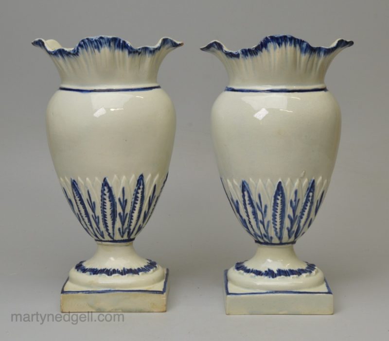 Pair of pearlware pottery shell edge pouch vases, circa 1800