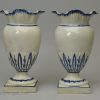 Pair of pearlware pottery shell edge pouch vases, circa 1800