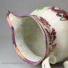 Pearlware pottery jug moulded with equestrian figures and decorated with overglaze enamels and pink lustre, circa 1820