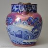 Pearlware pottery jug decorated with blue transfer prints under the glaze and pink lustre over the glaze, circa 1820