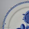 London delft charger painted in blue with a rose, circa 1760