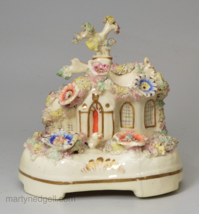 Staffordshire porcelain cottage and dog, circa 1840