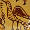 Staffordshire slipware dish trail decorated with a bird, circa 1740