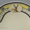 Creamware pottery dessert dish decorated with a family crest, circa 1800, one of two