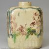 Creamware pottery tea canister decorated with moulding and colours under the glaze, circa 1770, William Greatbatch Pottery