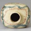 Creamware pottery tea canister decorated with moulding and colours under the glaze, circa 1770, William Greatbatch Pottery