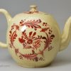 Creamware pottery teapot decorated with red enamel over the glaze, circa 1770