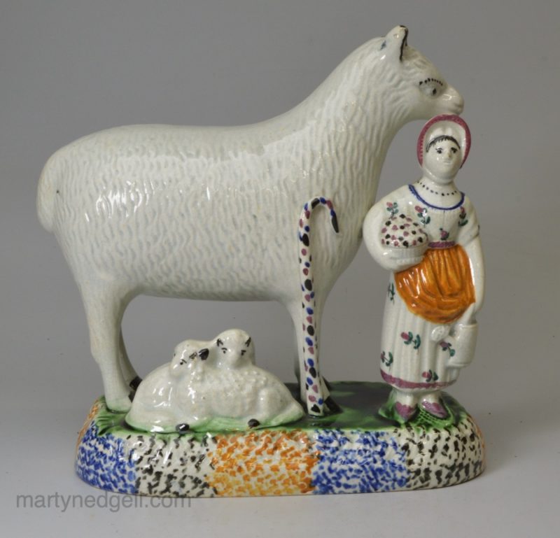 Yorkshire type prattware pottery large sheep, lambs and an attendant, circa 1820