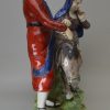 Oversize Staffordshire pearlware pottery figure of Return from Egypt, circa 1820