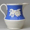 Small pearlware jug decorated with blue slip and sprigs, circa 1830