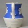 Small pearlware jug decorated with blue slip and sprigs, circa 1830