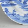 Liverpool delft plate, circa 1750 painted with figures in a rural landscape