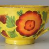 Canary yellow toy cup and saucer, circa 1820