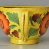 Canary yellow toy cup and saucer, circa 1820