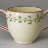 Wedgwood creamware pottery two handled cup and saucer, circa 1790