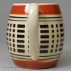 Mochaware creamware mustard pot with an inlaid slip decoration, circa 1820