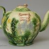 Creamware p[ottery teapot moulded with the Landskip pattern and coloured under the glaze, circa 1770