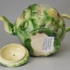 Creamware p[ottery teapot moulded with the Landskip pattern and coloured under the glaze, circa 1770