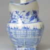 Pearlware pottery cream jug decorated with a blue transfer print under the glaze, circa 1820