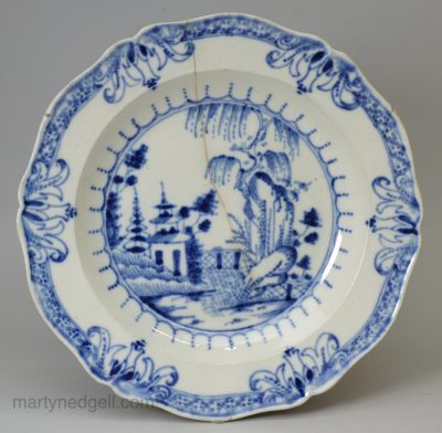 Pearlware pottery plate decorated with blue under the glaze, circa 1800