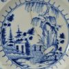 Pearlware pottery plate decorated with blue under the glaze, circa 1800