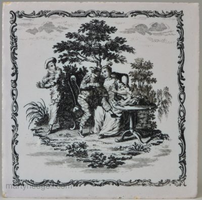 Liverpool delft tile decorated with a Sadler print of Harlequin and Columbine surprised by Pierrot , circa 1770