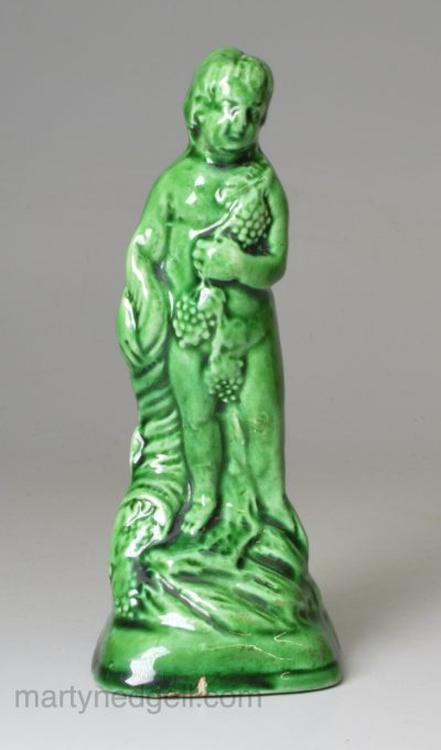 Creamware Bacchus decorated with green glaze, circa 1800