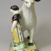 Yorkshire type prattware pottery large sheep, lambs and an attendant, circa 1820